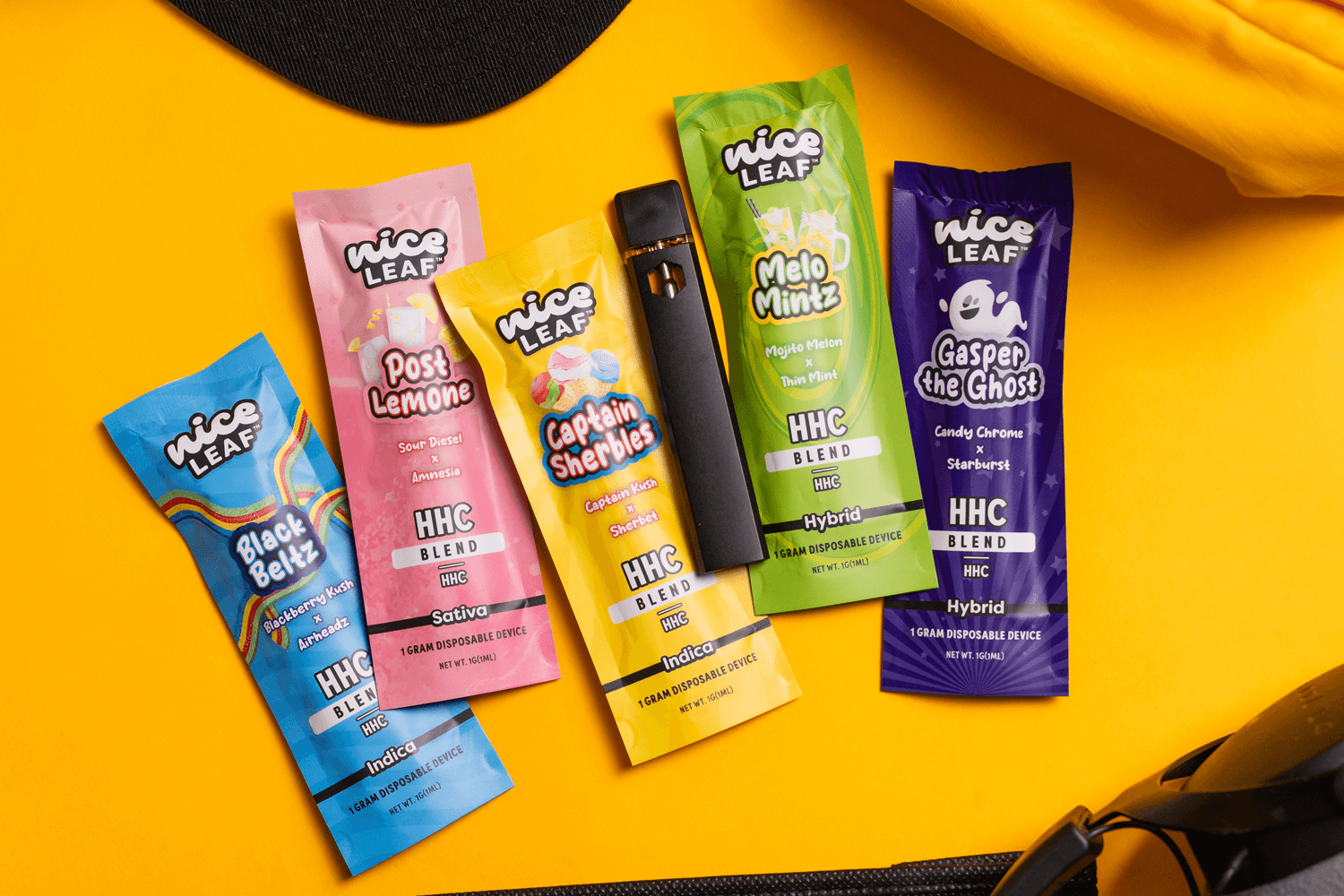 assorted nice leaf vape pens displayed on a yellow background